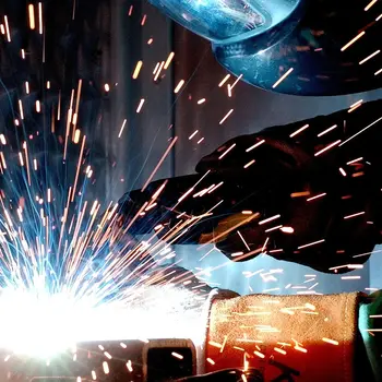 Student welding using an mig welder