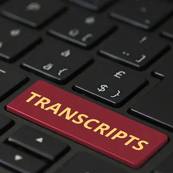Keyboard with a button that says Transcripts with red background.