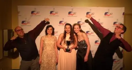 Five chefs with their trophy