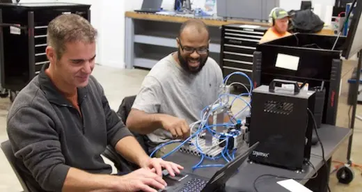 Two men in an industrial maintenance class