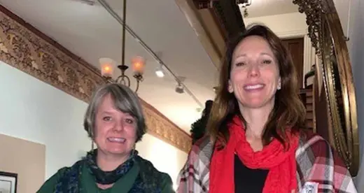Two women on a staircase