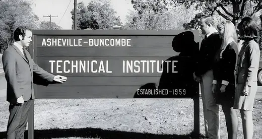 Students in the 1960's standing in front of the A-B Tech sign.