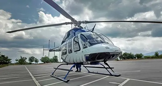 Helicopter on asphalt parking lot