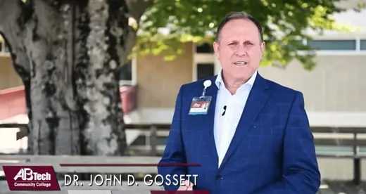 John Gossett standing outside