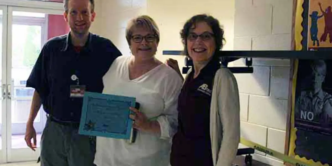 Shelly Blackburn receiving and award