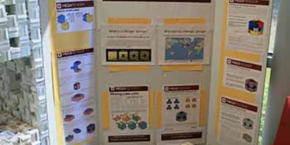 Tri-fold board with information about Menger Sponges