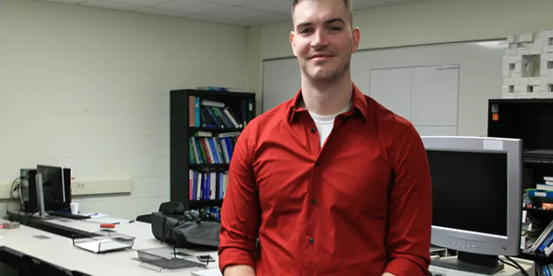 Phillip Whiting standing in computer lab