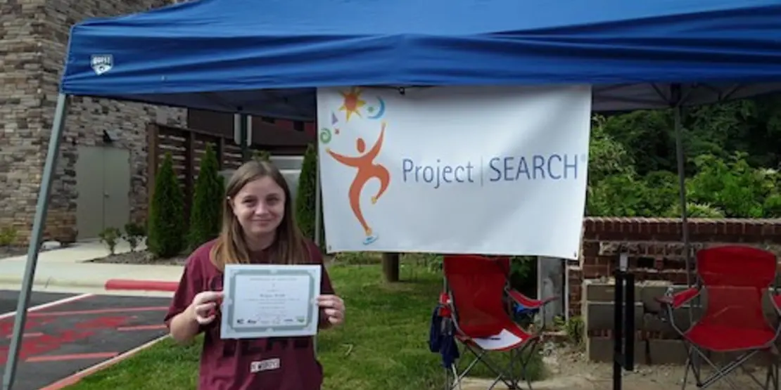 Megan Webb with certificate