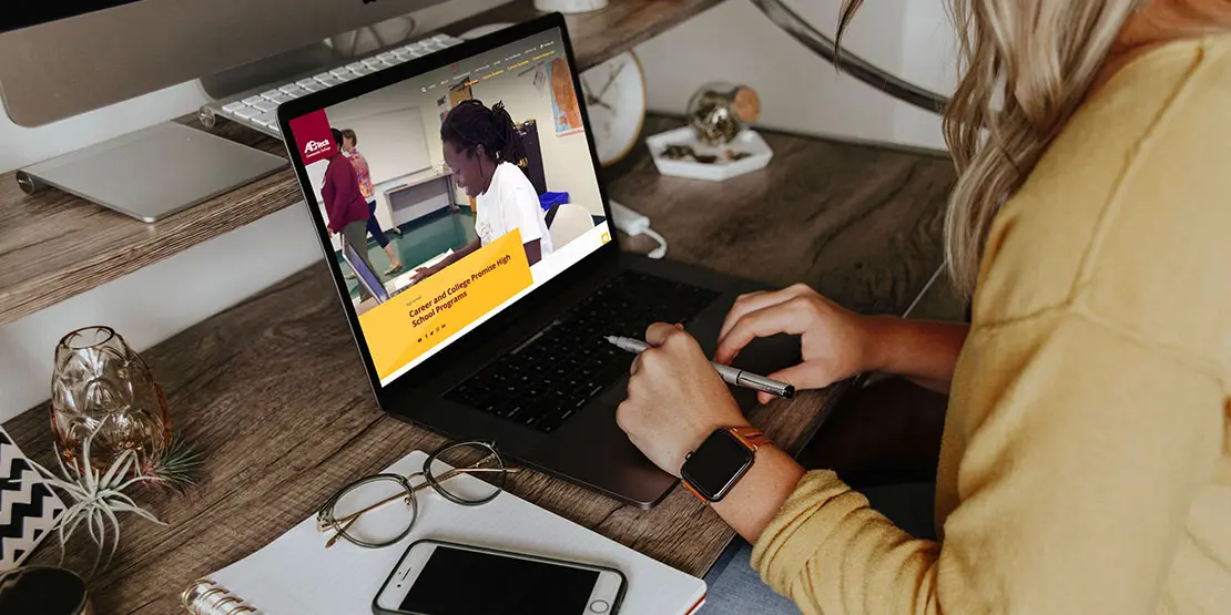 Someone typing on a laptop