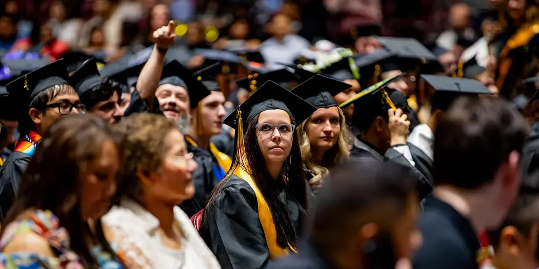 A-B Tech graduates sit inside Harrah's Cherokee Center during the university's graduation ceremony, May 10, 2025, in Asheville.