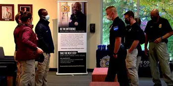 Law enforcement officers standing in lobby