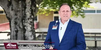 John Gossett standing outside